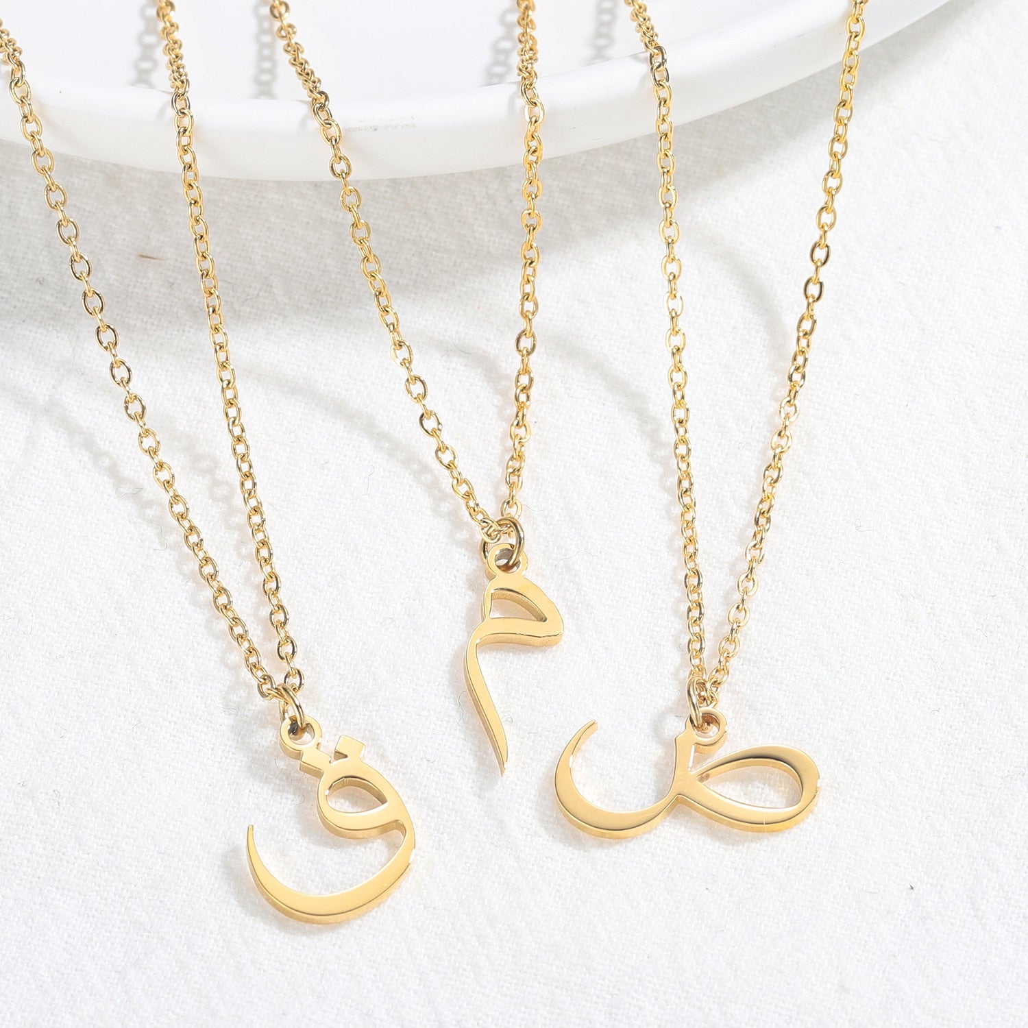 Collier initial en arabe