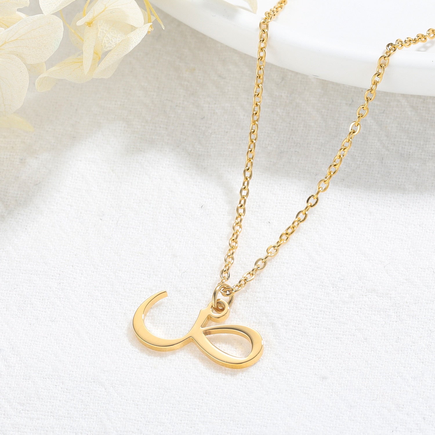 Collier initial en arabe